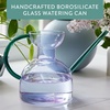 image:imageModern Sprout Plant Watering Can  Handcrafted from Borosilicate Glass  Long Spout Vessel for Indoor Plants  32 Oz Capacity  Multipurpose Watering Can amp Flower Vase for Houseplants PurpleEmeraldPurpleEmerald